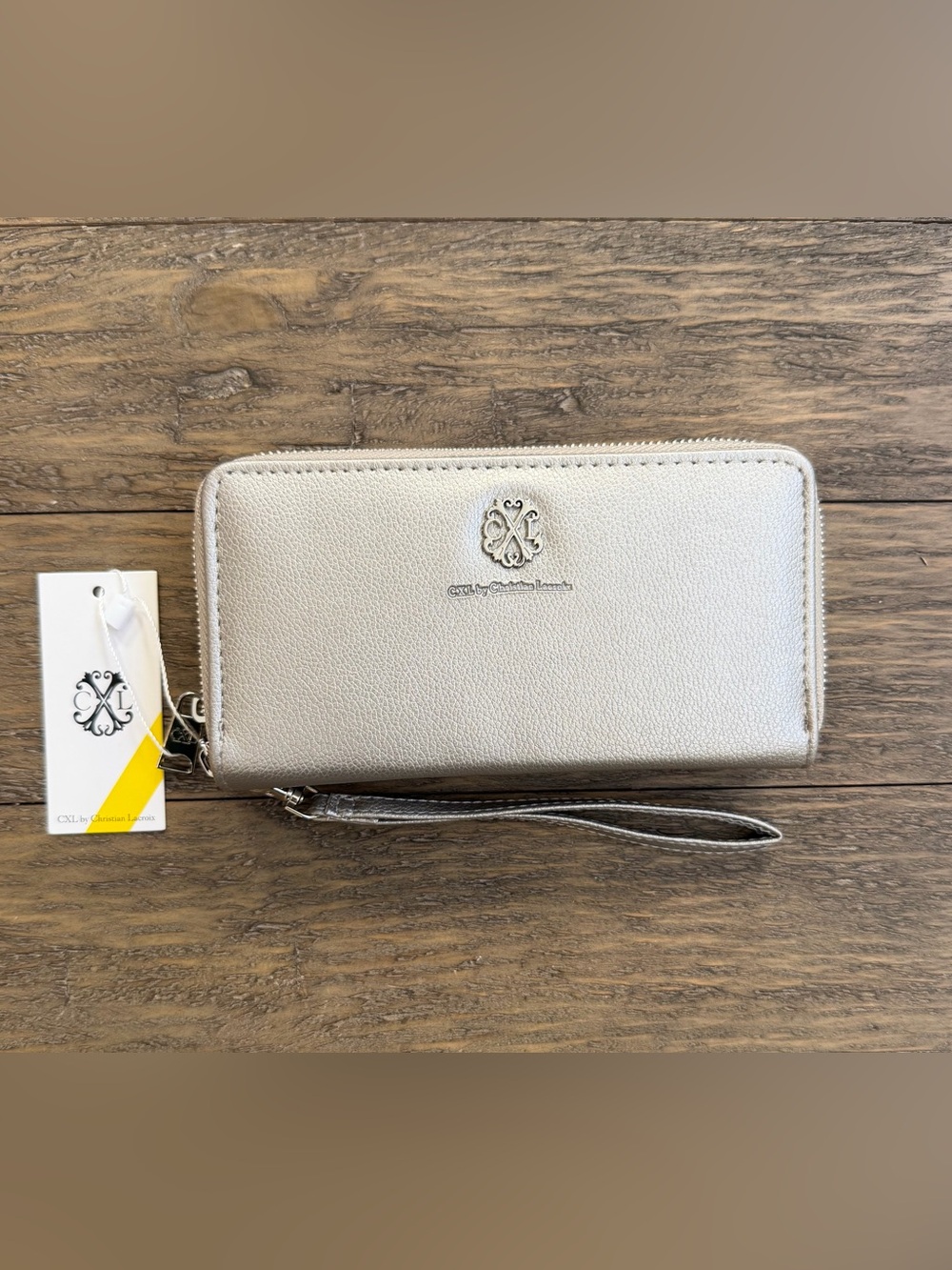 CXL by Christian Lacroix pewter zipper wallet
New with tags
MSRP $58